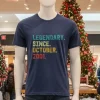 Navy t-shirt: "21 Year Old Legend Since October 2001".