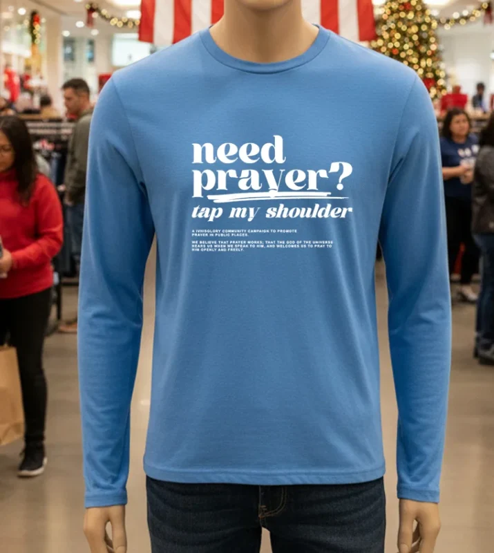 Blue shirt with prayer message.